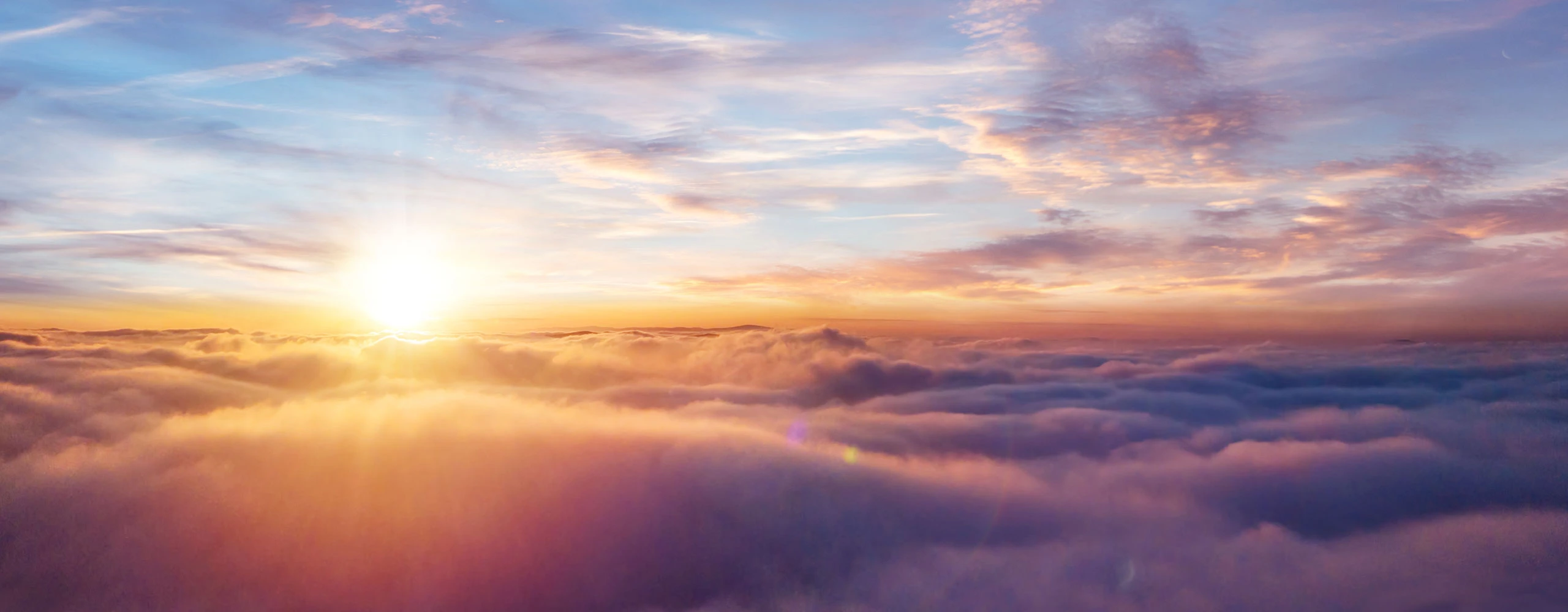 Sun over clouds