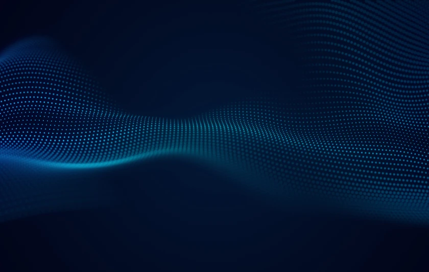 Abstract blue wave pattern of glowing dots