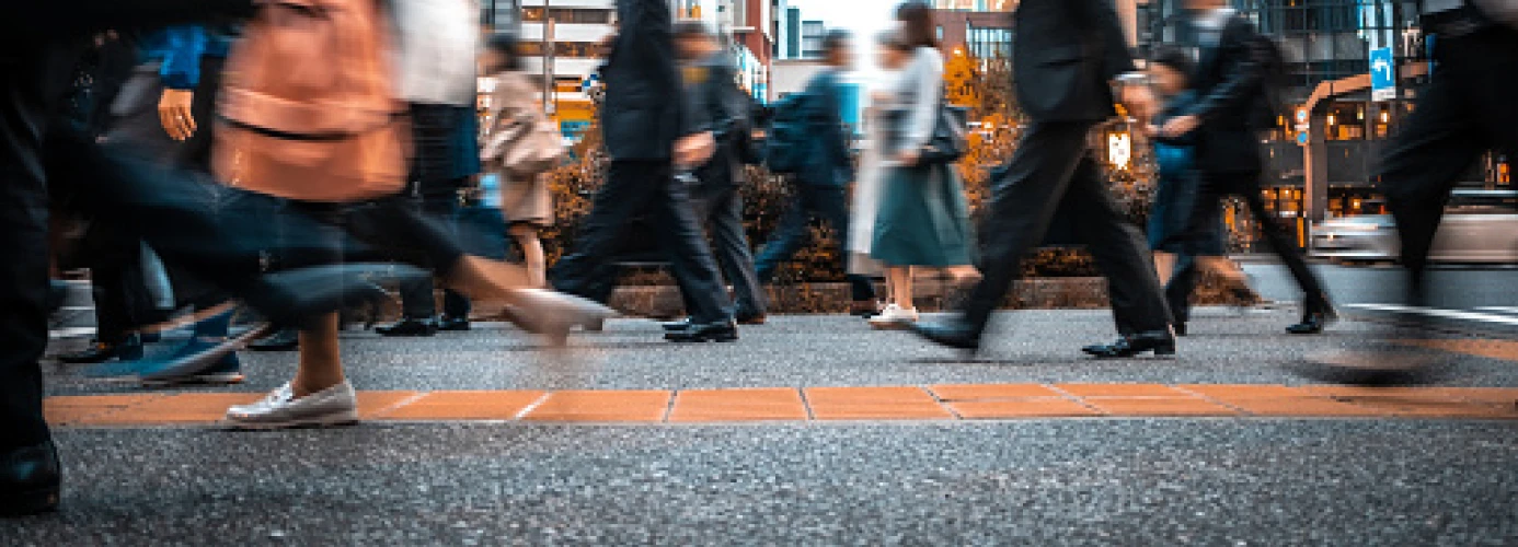 Blurred city street with pedestrians