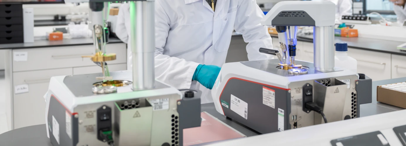 Scientist examining sample in laboratory