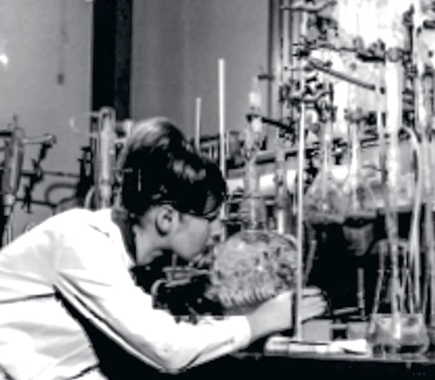 A historic photo of a female research scientist