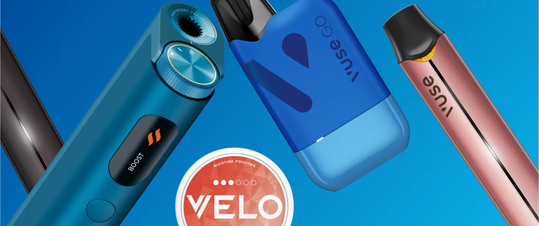 An assortment of vaping devices and nicotine pouches on blue background
